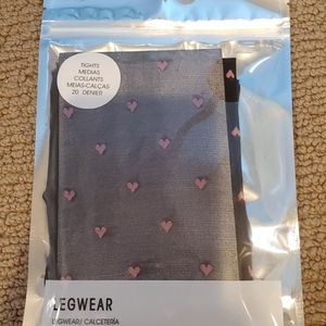 Black tights with pink hearts
